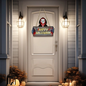 Halloween door sign with skeleton holding a Happy Halloween board on a white door