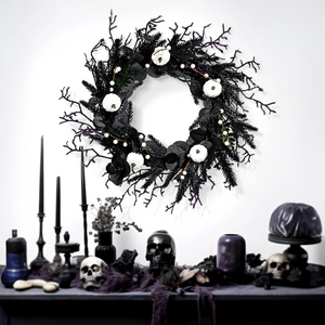 Halloween wreath with black branches, white pumpkins, and purple accents on white background