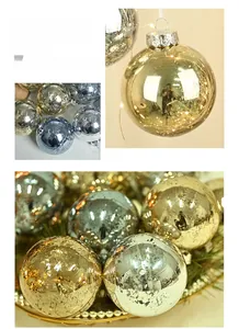 Detail of assorted gold and silver Christmas ornaments with vintage mercury glass texture