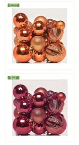 Detailed view of bronze and burgundy Christmas baubles with matte and glitter textures