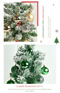 Detail of assorted Christmas balls with matte and textured finishes on a tree branch