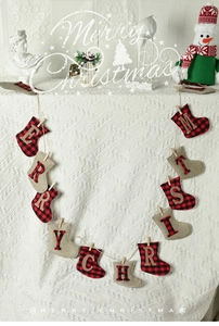 Christmas burlap banner featuring red buffalo plaid socks with Merry Christmas letters