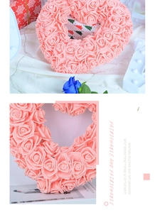 Detailed close-up of light pink heart-shaped rose wreath made of PE foam material