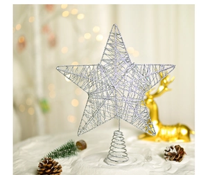 Close-up of silver hollow Christmas tree star topper with glitter finish and spiral base