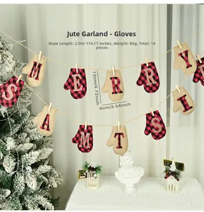 Detail of burlap Merry Christmas glove banner hanging in a cozy holiday indoor setting
