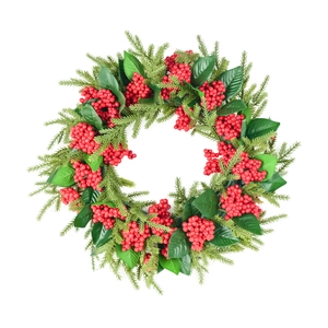 Front view of festive red berry wreath with green pine needles and leaves on white background