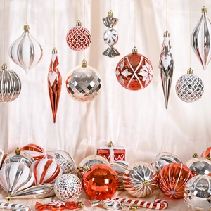 Red and silver Christmas ball ornaments set with glitter and plated finishes on silk