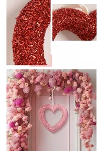 Macro detail of red and pink sequined heart wreaths hanging with romantic ribbons