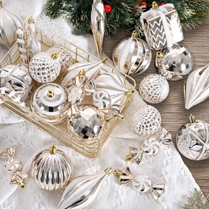Champagne gold and white Christmas tree ornaments set with matte and glitter finishes