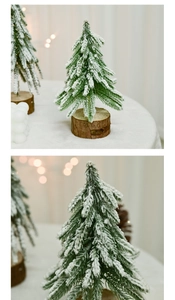Macro detail of snow-flocked Christmas tree branch and rustic natural wooden base