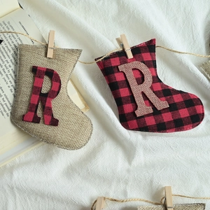 Christmas burlap mini stockings with red plaid letter R hanging on twine decorations
