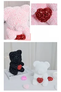 Close-up of handmade 20cm foam glitter rose bears in pink black and white with red hearts