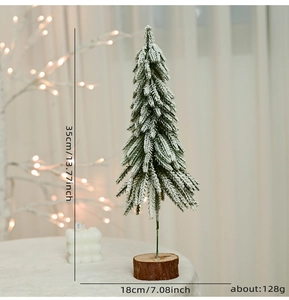 Flocked mini Christmas tree detail with 35cm height and natural wooden base texture