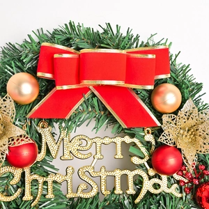 30cm Christmas wreath with green pine needles, red bow and golden Merry Christmas sign