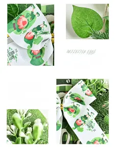 Detailed macro view of St. Patrick's Day wreath with clover ribbons and berries