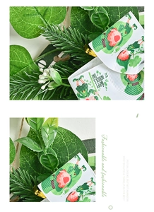 Detail of St. Patrick's Day wreath featuring green foliage and Happy St. Patrick's Day ribbon