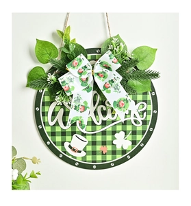 Detail of St. Patrick's Day welcome wreath with green clover bow and checkered pattern