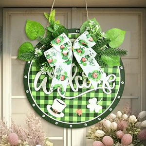 St. Patrick's Day Welcome wreath with green buffalo plaid and shamrock bow decor