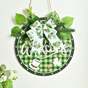 St. Patrick's Day Welcome wreath with green clover, plaid bow, and festive wood door sign