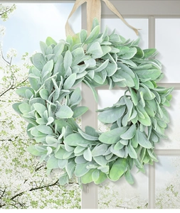 Detailed view of flocked lamb's ear wreath with hanging ribbon for spring decor
