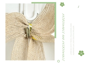 Close-up of decorative jute bow with silver metal hook and gold tie detail