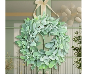 Detail of flocking lamb's ear leaves with a rustic beige burlap bow for home decoration