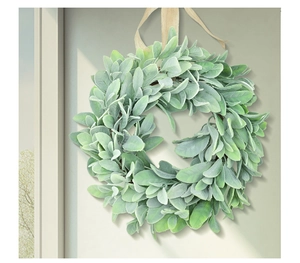 Detail view of sage green flocked lamb's ear wreath with rustic hanging rope