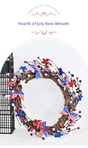 Close-up of Independence Day wreath with red white blue stars and American flag bow