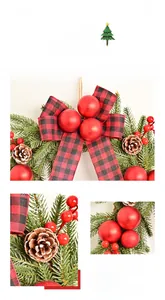 Detail of Christmas wall swag with red berries, pine cones and tartan bow decoration