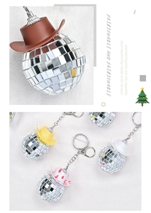 Detail of mirror disco ball cowboy hat keychain with metallic chain and various hat colors