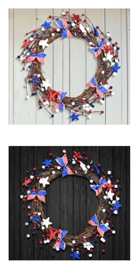 Close-up of patriotic Independence Day wreath with stars, berries and burlap bow