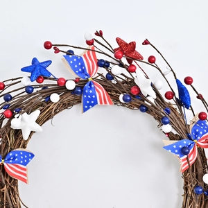 Independence Day wreath with red white blue berries and stars on natural vine base