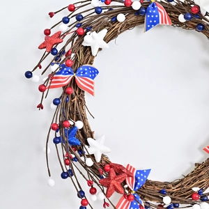 Patriotic July 4th wreath with red white blue berries stars and stars-and-stripes bows