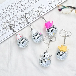 Disco ball cowboy hat keychains in various colors with shiny reflective mirror surface