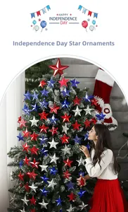 Detail of red white and blue star ornaments hanging on a festive branch for decor