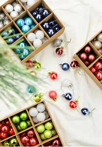 Close-up of 72pcs colorful Christmas ball ornaments in a kraft paper storage box