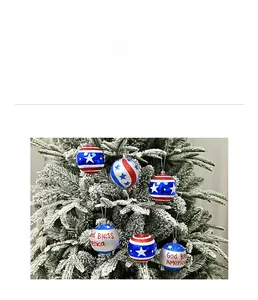 Detail of USA themed Christmas ball ornaments with stars, stripes and God Bless America text
