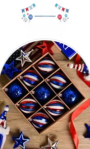 Set of 9 American Independence Day ornaments with red, white, and blue patterns in a box