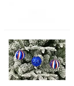 Detail of red white and blue striped glitter Christmas ornaments for festive tree decor