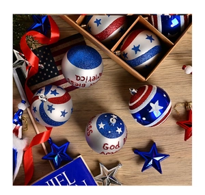 Close-up of patriotic 8cm Christmas balls with God Bless America stars and stripes patterns