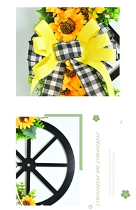 Detail of sunflower wreath with black and white gingham ribbon on wheel hub