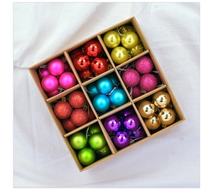 Detail of 72pcs multi-color 3cm Christmas ornaments in kraft box with various finishes
