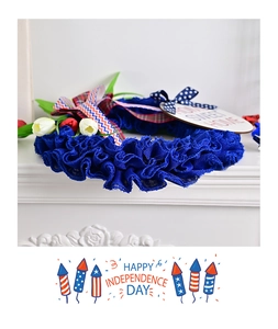 Detail of Independence Day wreath with Home Sweet Home wood sign and faux tulips
