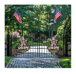 Close-up of patriotic welcome door wreath with American flag bow and lush greenery