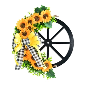 Sunflower wagon wheel wreath with bumblebee bow decoration for festive door hanging