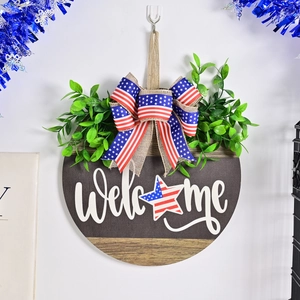 American flag themed wooden welcome sign with star pattern and faux greenery for door