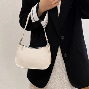 Chic off-white lychee pattern hobo bag with silver zipper and curved silhouette for women