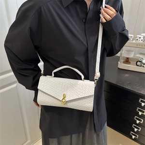 White crocodile pattern handbag with gold gourd buckle and crossbody strap for women