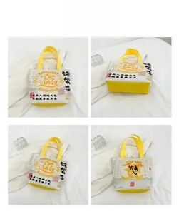 Multi-angle views of a canvas tote bag featuring Chinese calligraphy and yellow handles