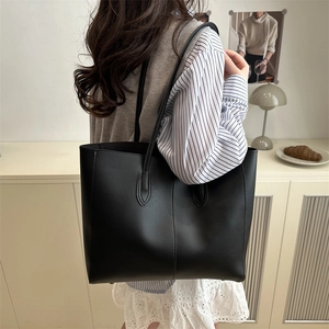 Minimalist black large capacity faux leather tote bag for women shoulder commute style